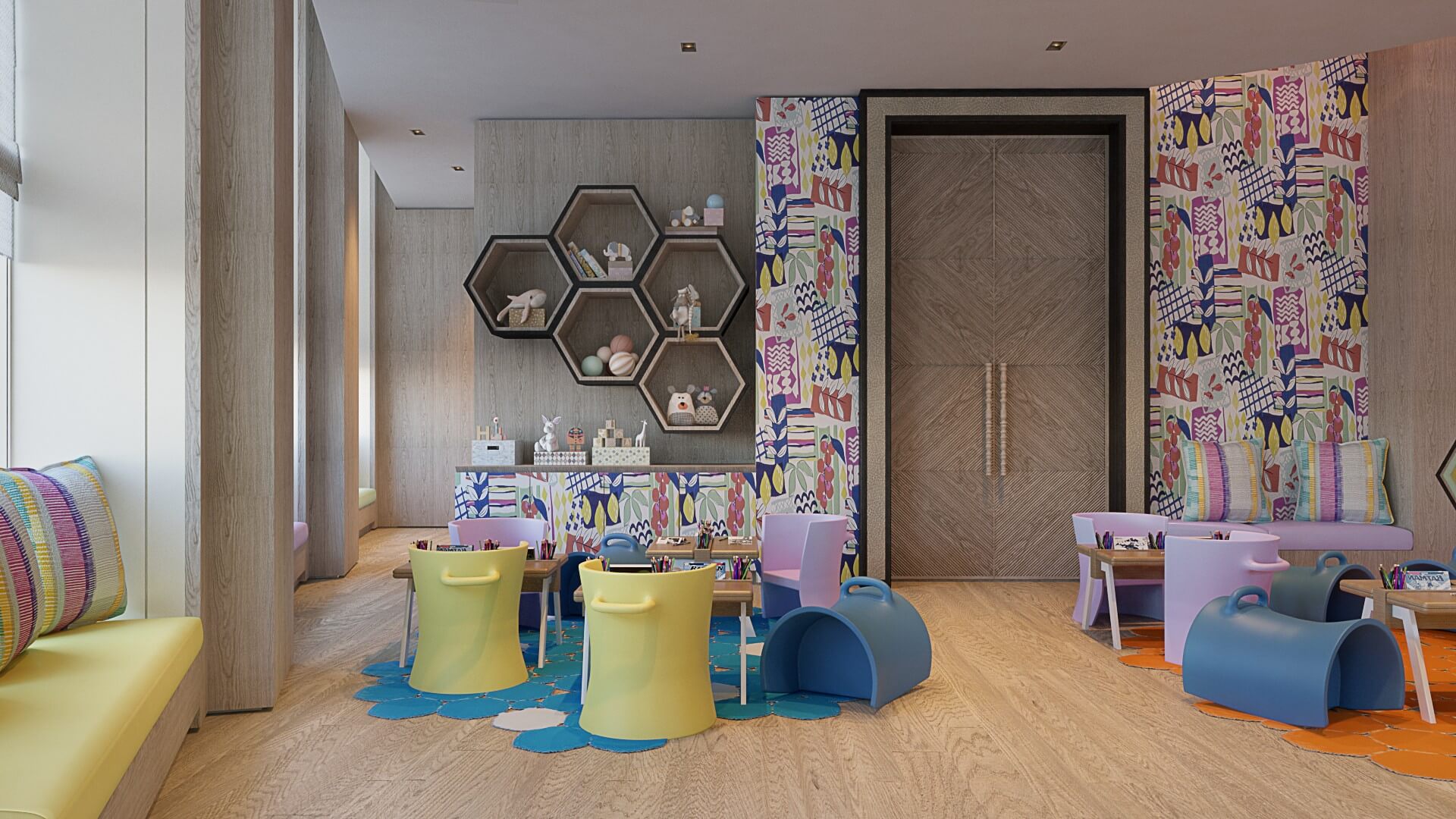 A colorful, vibrant children's playroom featuring soft play structures, hexagon-shaped wall shelving for toys, and light wood flooring.