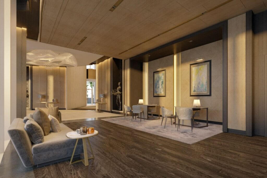 Luxury lounge area with contemporary seating, dark wood flooring, and warm interior lighting.