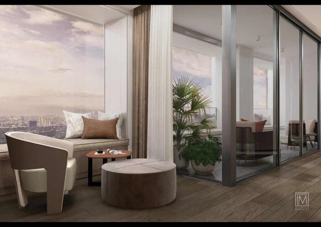 Modern living space with round velvet ottoman, light grey sofa, and glass sliding doors leading to a balcony with greenery.