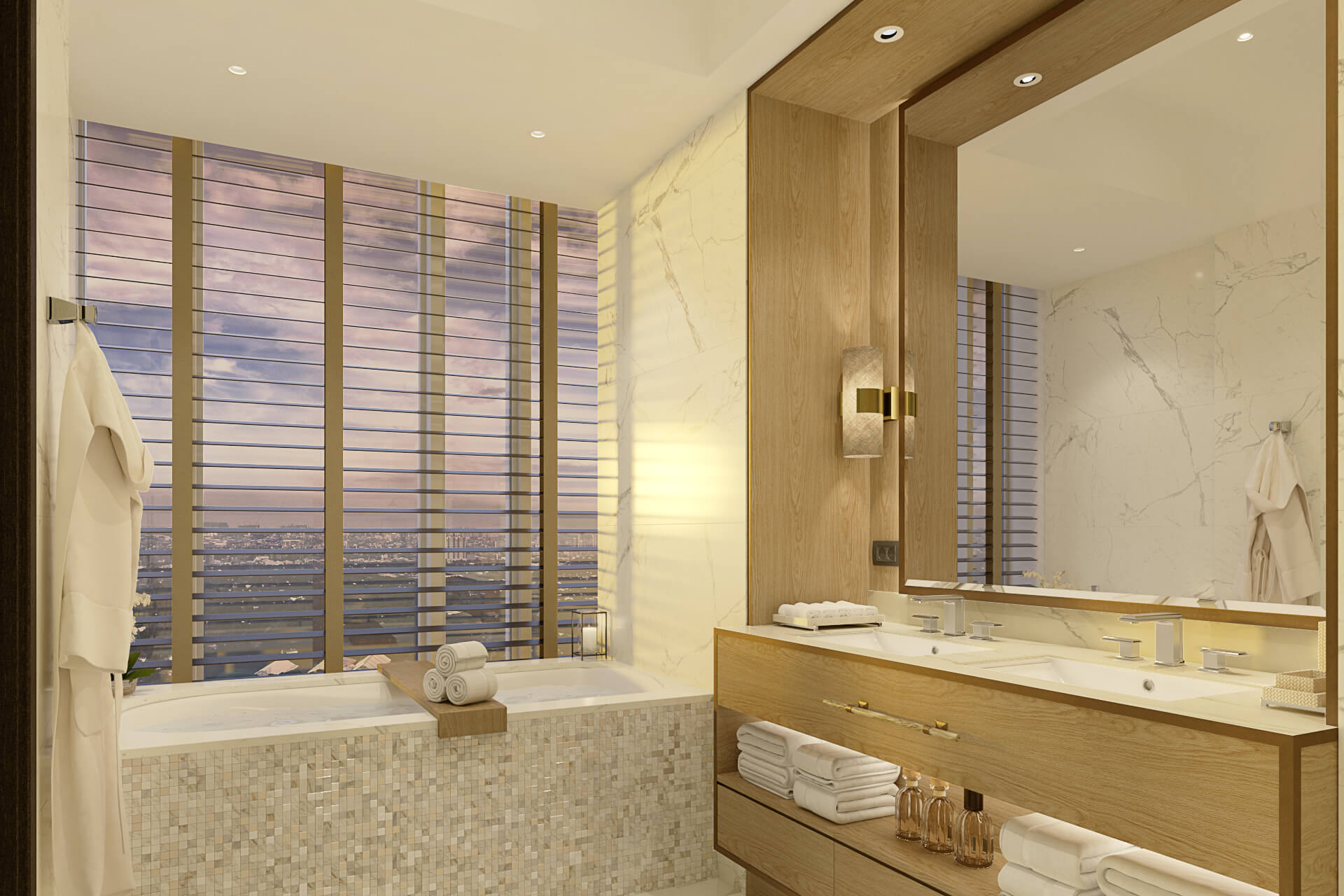 An elegant master bathroom with a mosaic-tiled bathtub by a window with city views, a double wood vanity, and marble walls.